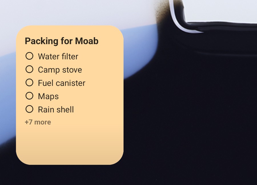 A TackNote widget on an Android Home Screen showing a packing checklist with +7 more at the bottom